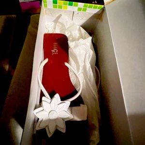 Unique white and a brown wood bottom size 8